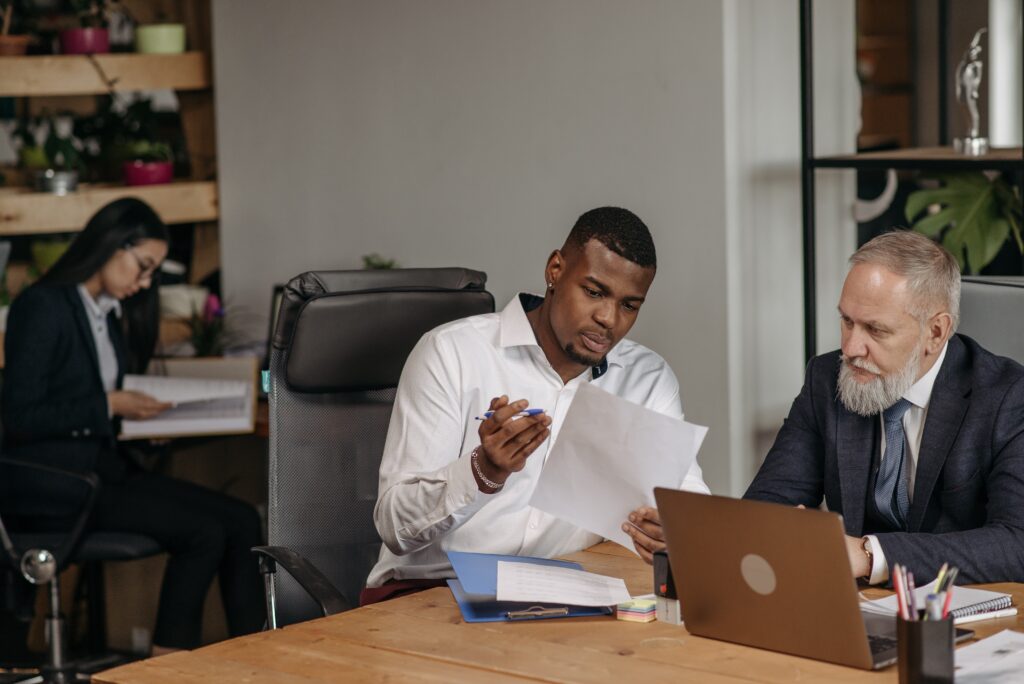 Two gentlemen having a discussion: outsourced accountant