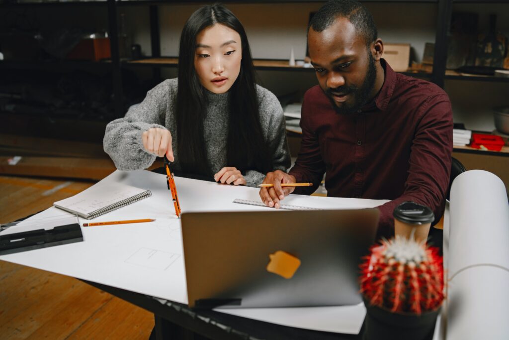 Two colleagues working together: outsourcing risk management