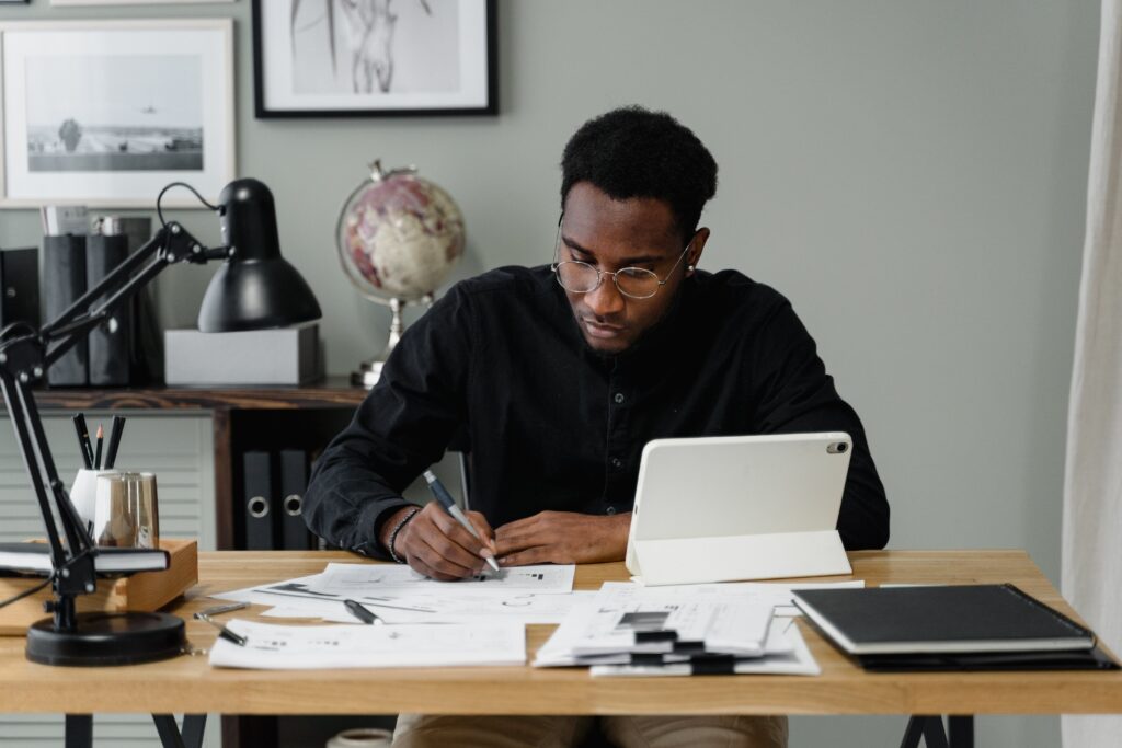 A man doing some paperwork: outsourced data entry